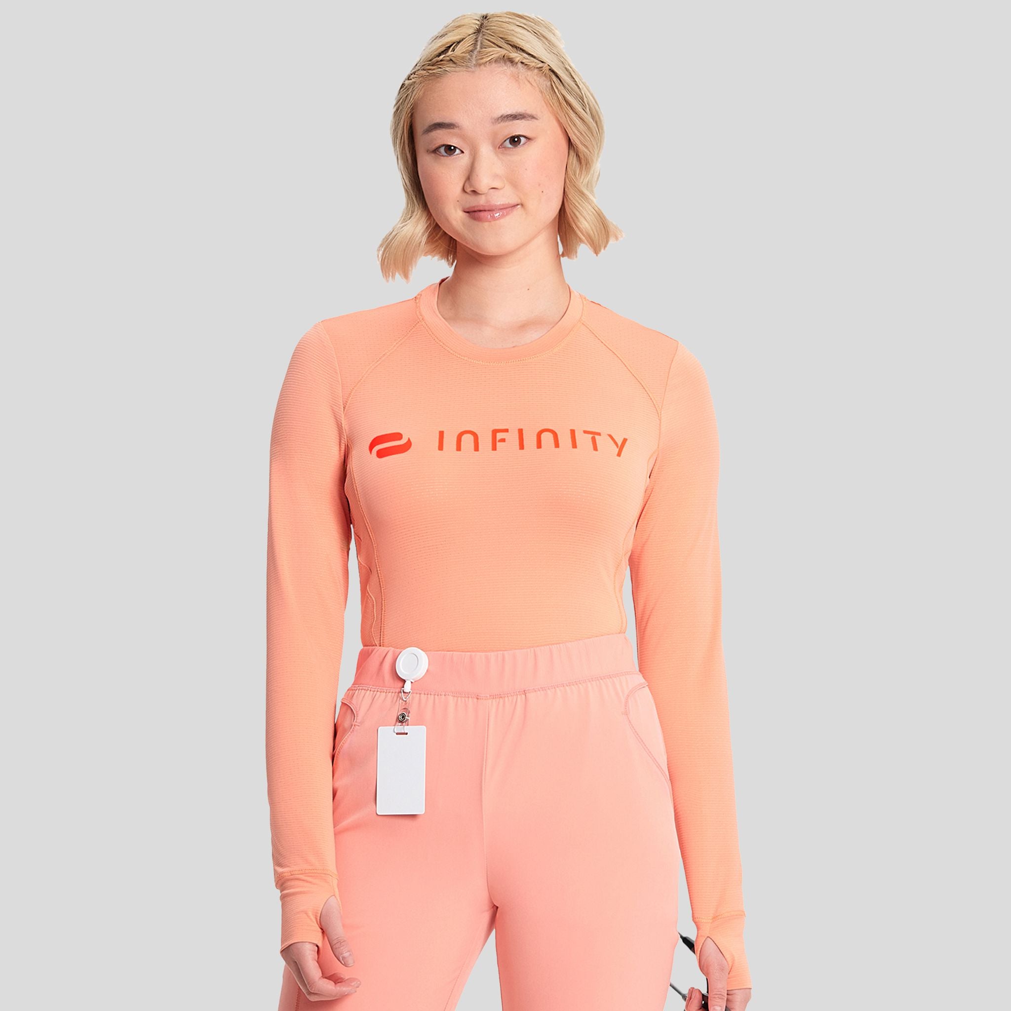 IN_INFINITY_GNR8_LOGOPERFORMANCEUNDERSCRUB_641_ELECTRICCORAL_FRONT2